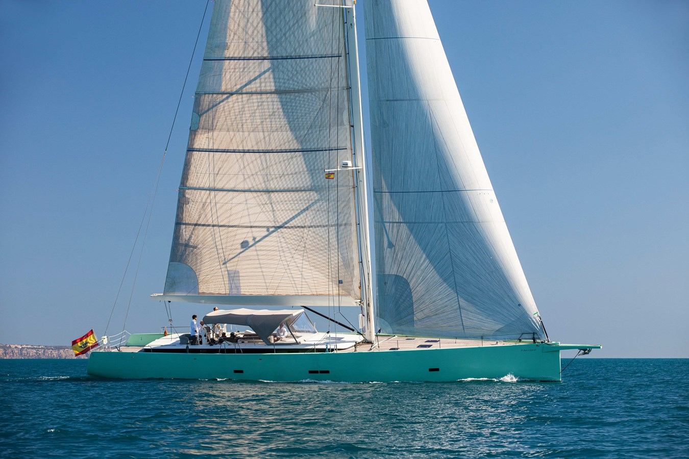 Exterior image of Y Yachts PEREGRIN 78 sailing yacht for sale showcasing her modern sailing profile, sleek hull lines, and clean open deck areas.