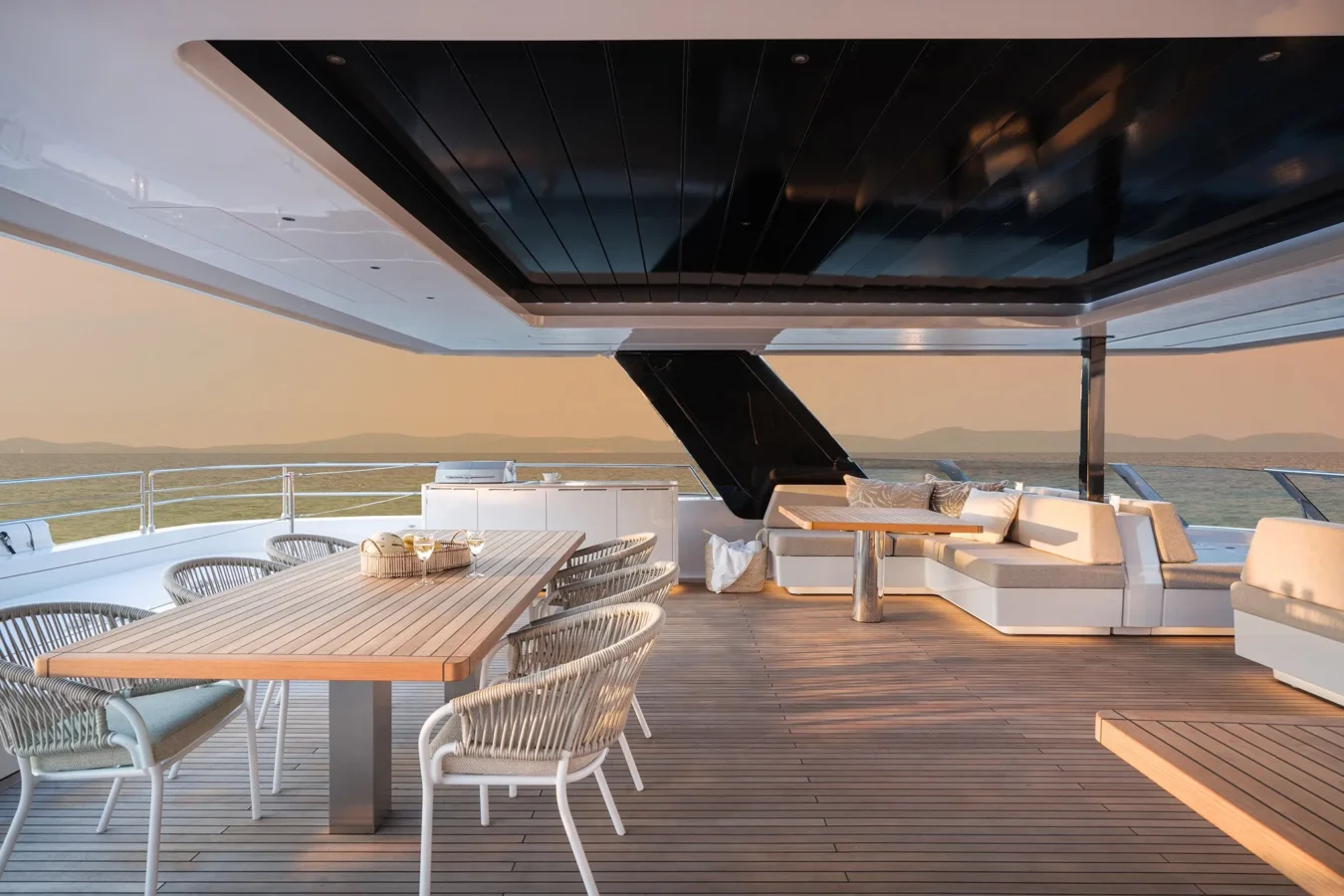 Spacious flybridge of Sunreef Yachts 80 Kokomo featuring comfortable seating and panoramic views.