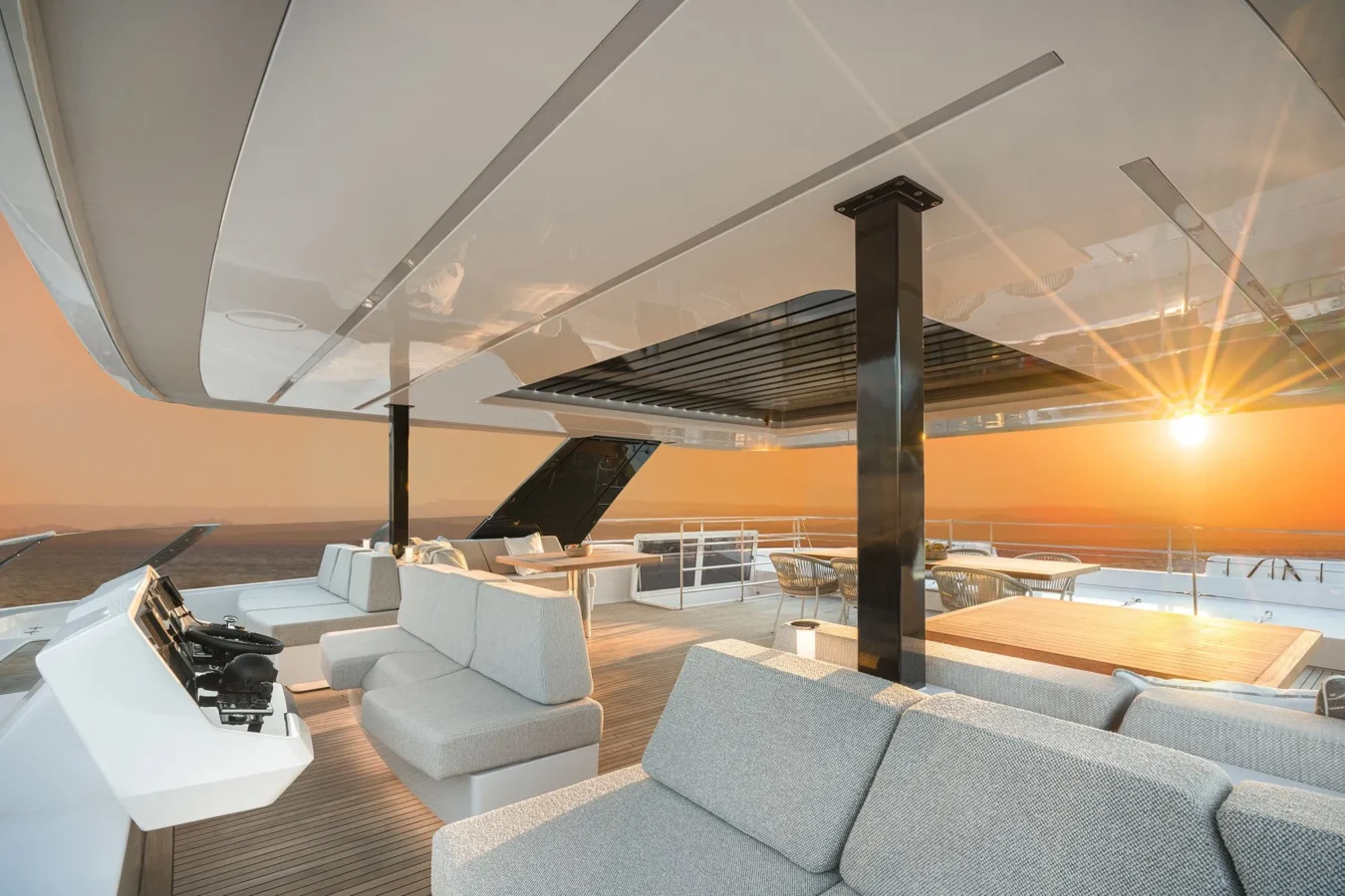 Spacious flybridge of Sunreef Yachts 80 Kokomo featuring comfortable seating and panoramic views.