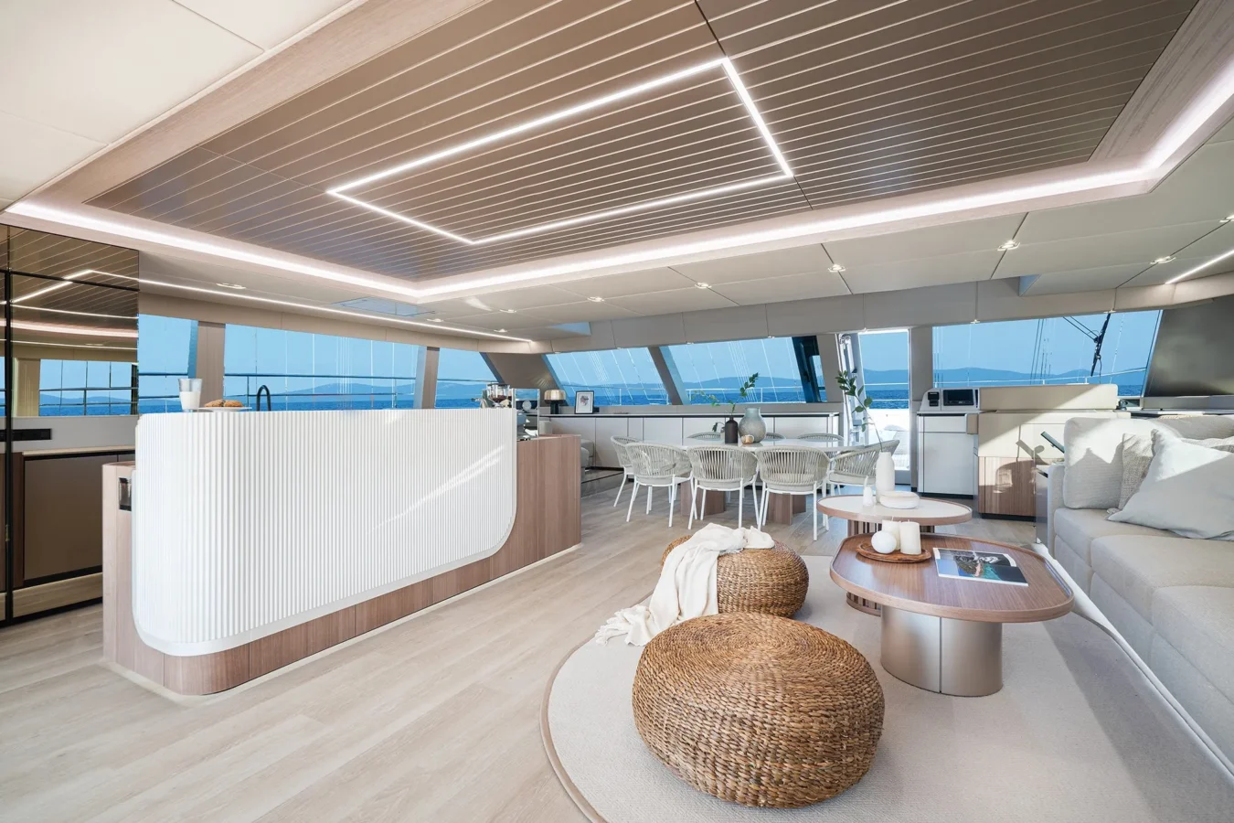 Stylish bar and comfortable sitting area on Sunreef Yachts 80 Kokomo’s deck with ocean views.