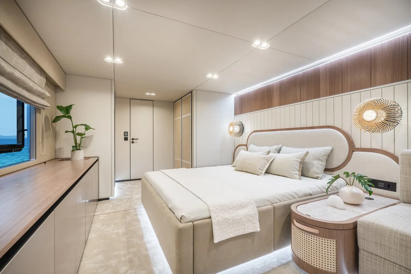Luxurious stateroom on Sunreef Yachts 80 Kokomo with elegant furnishings and ambient lighting.