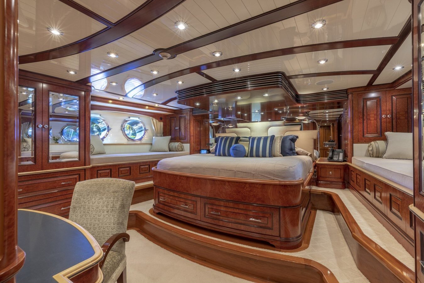 BURGER BOAT COMPANY NADAN 151 owner’s cabin with refined wood finish and luxurious furnishings.