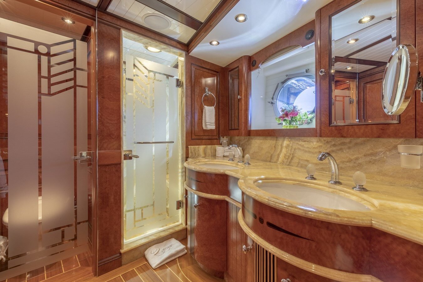 BURGER BOAT COMPANY NADAN 151 bathroom with elegant wooden finishes and modern amenities.