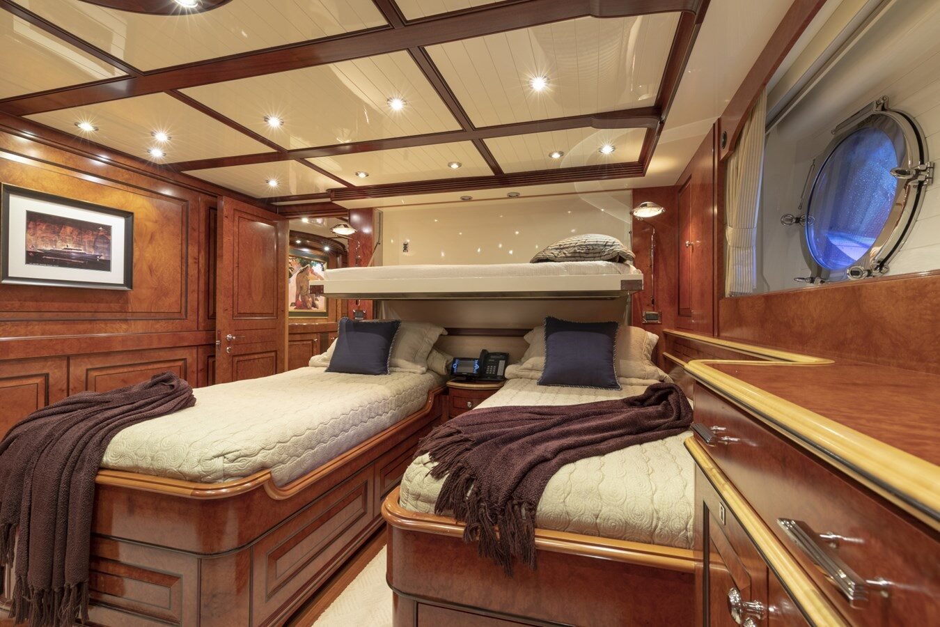 BURGER BOAT COMPANY NADAN 151 guest cabin with elegant wooden accents and refined comfort.