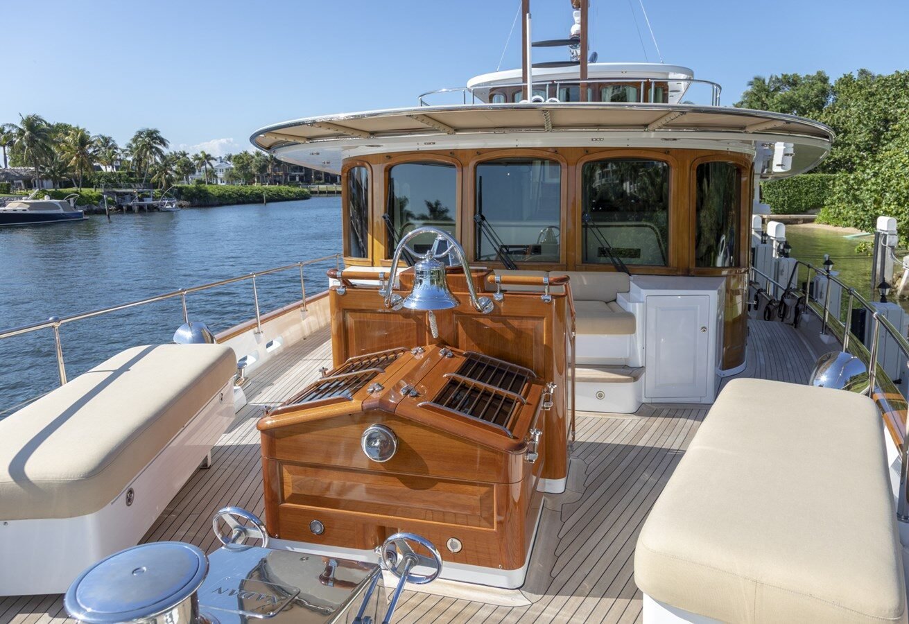 BURGER BOAT COMPANY NADAN 151 spacious deck with elegant layout and comfortable seating.
