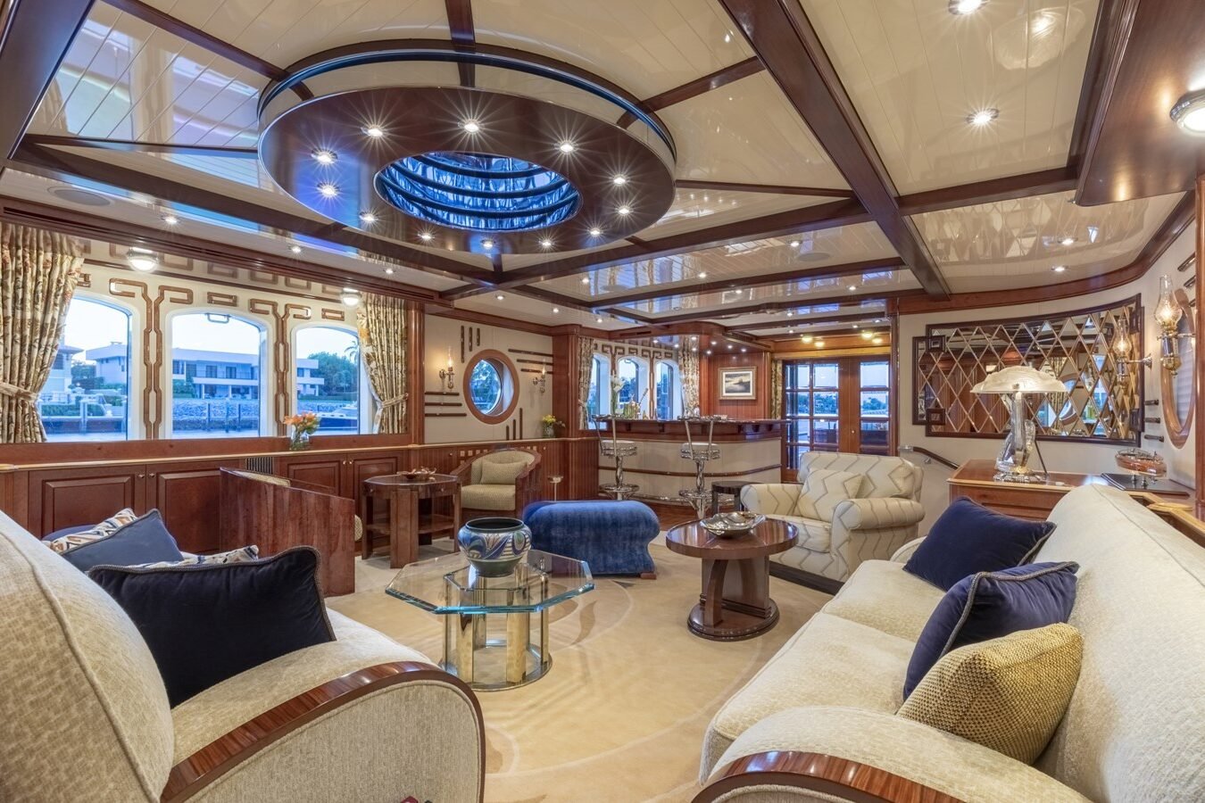 BURGER BOAT COMPANY NADAN 151 elegant salon with refined seating and ambient lighting.