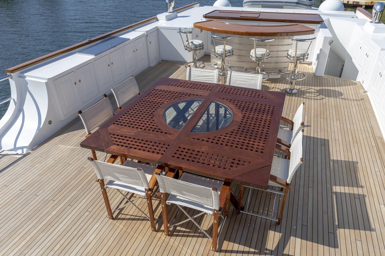 BURGER BOAT COMPANY NADAN 151 open dining area with bar setup for alfresco entertaining.