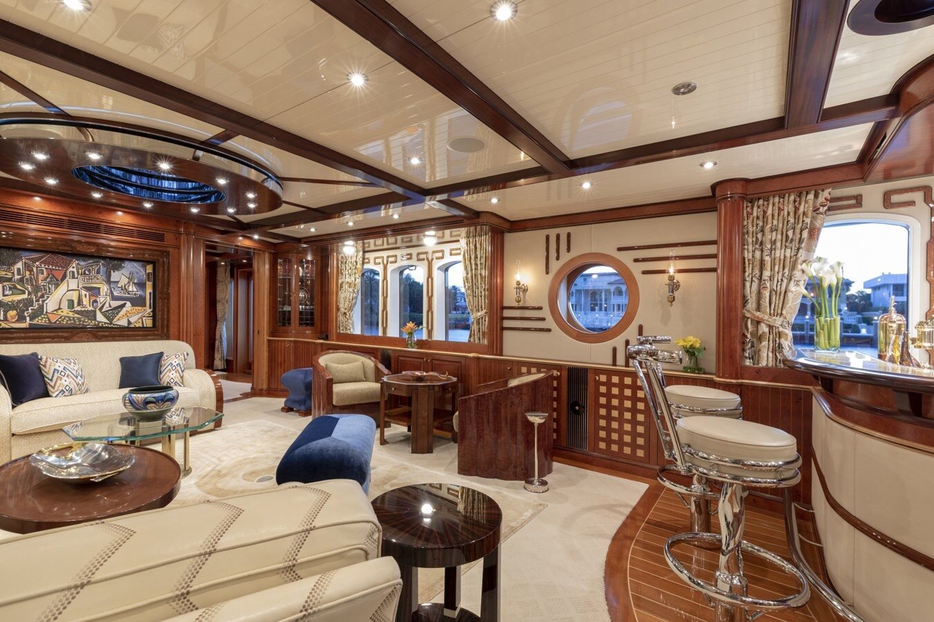 BURGER BOAT COMPANY NADAN 151 salon and bar with elegant wood detailing and refined lounge ambiance.