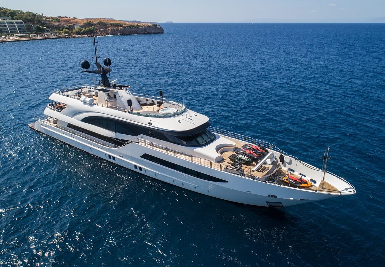 Miss Tor Yachts 167 HALLO relaxing near the coastline with serene surroundings.