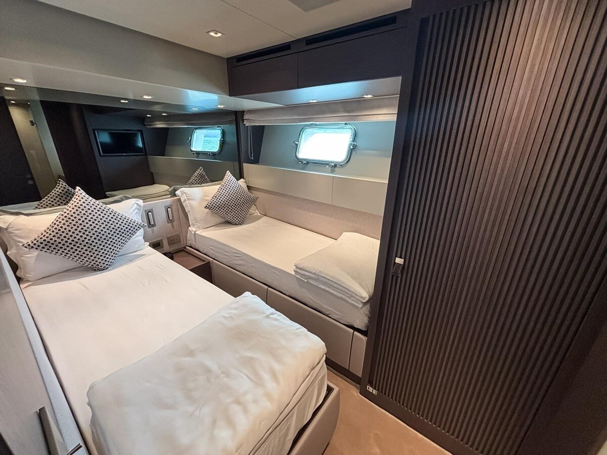 Sanlorenzo SX88 crew cabin with bunk beds and compact storage