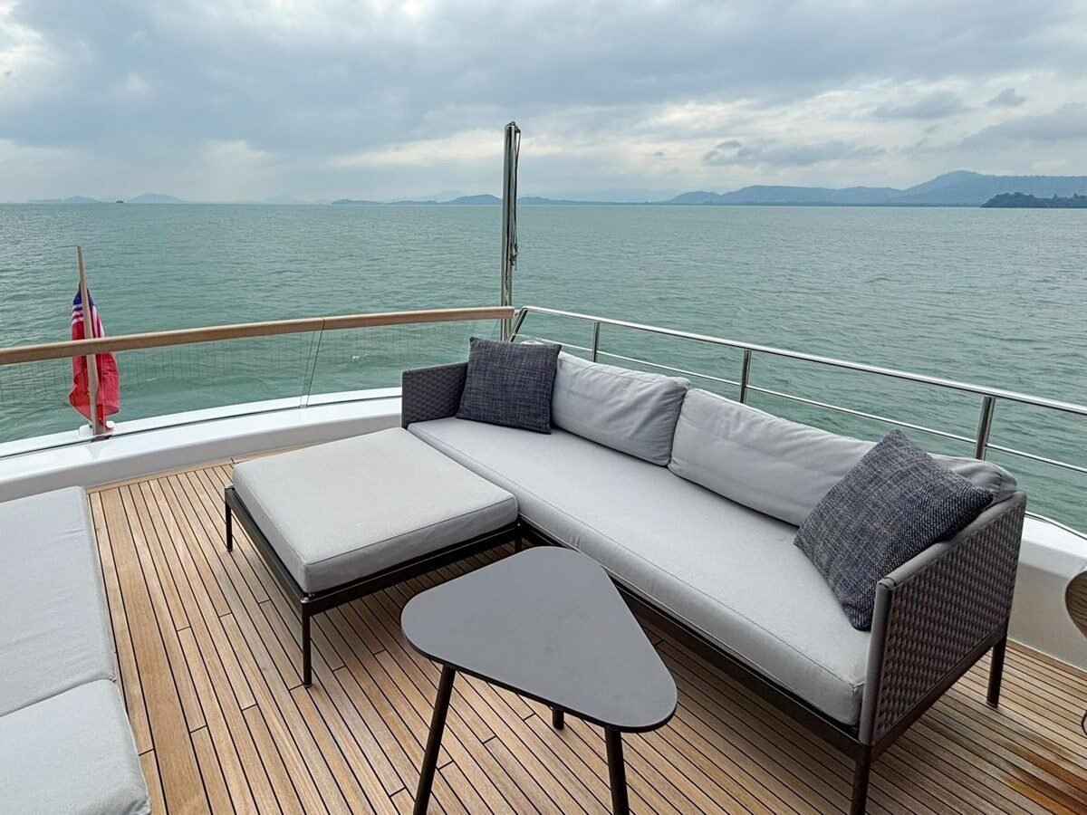 Sanlorenzo SX88 yacht side deck passage with teak flooring and railing