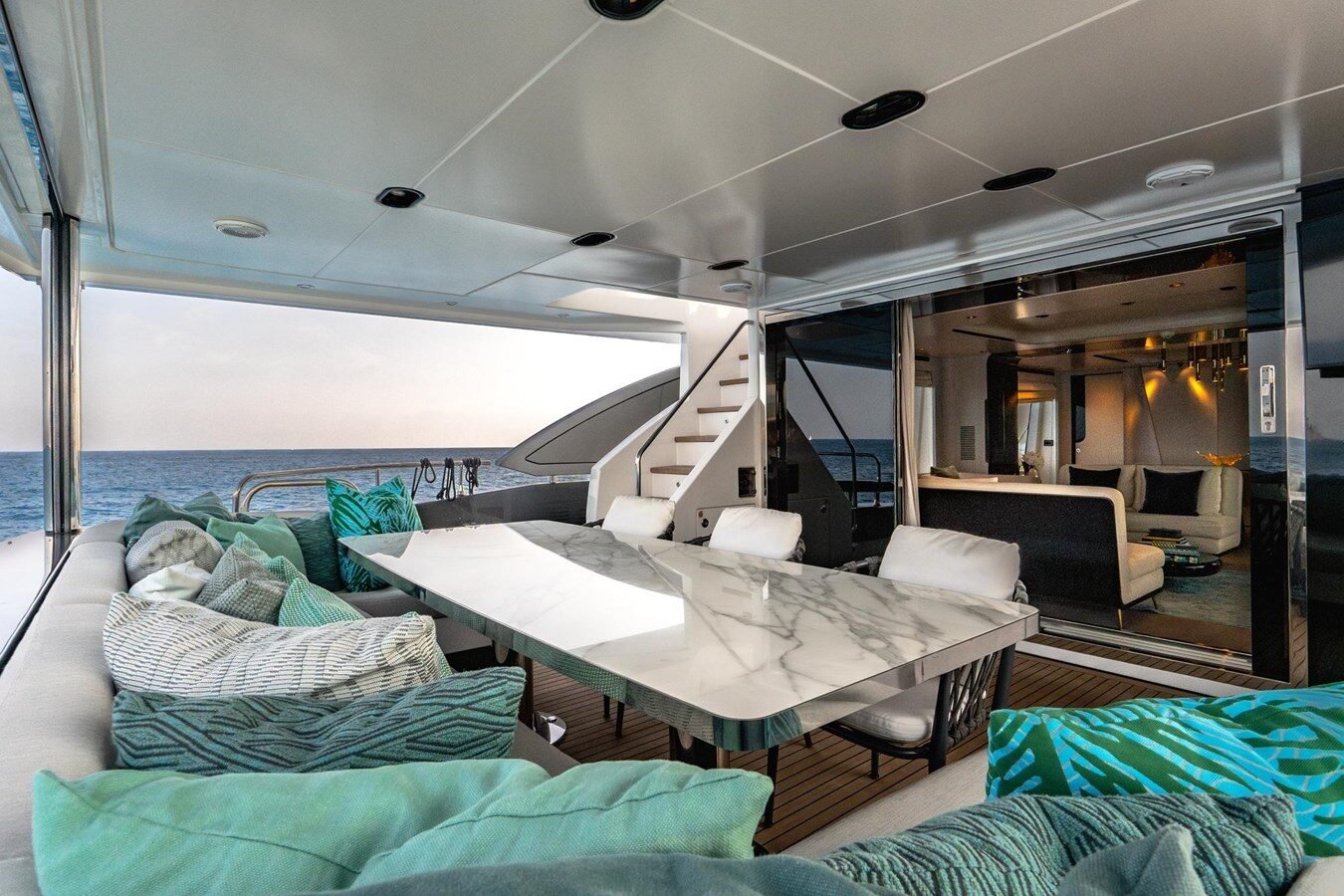 Intimate seating space at the yacht’s lower aft deck