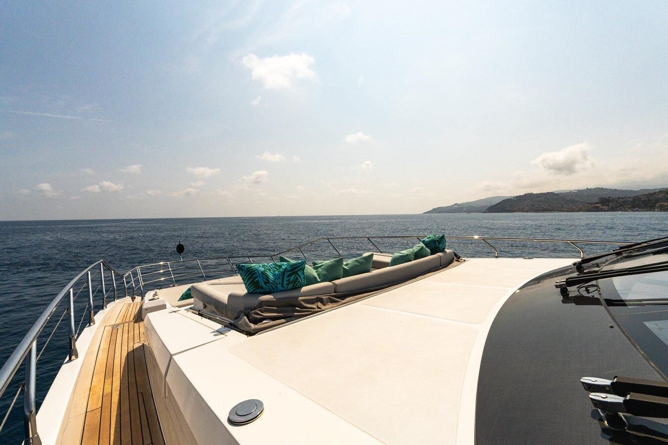Nighttime sundeck ambiance with soft lighting and lounge seating