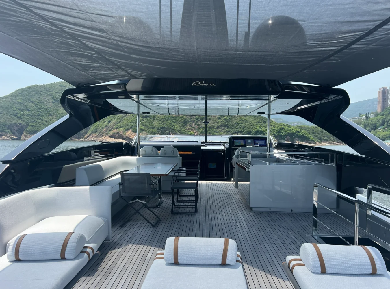 Flybridge of Riva 102’ Corsaro Super with a panoramic view toward the bow.