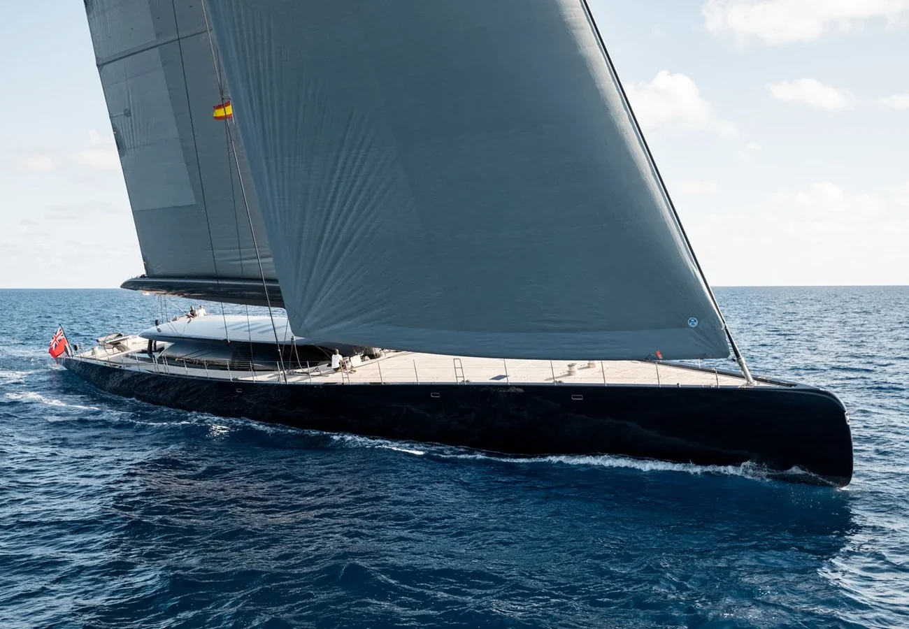 Royal Huisman 190 Ngoni yacht running at speed across open waters