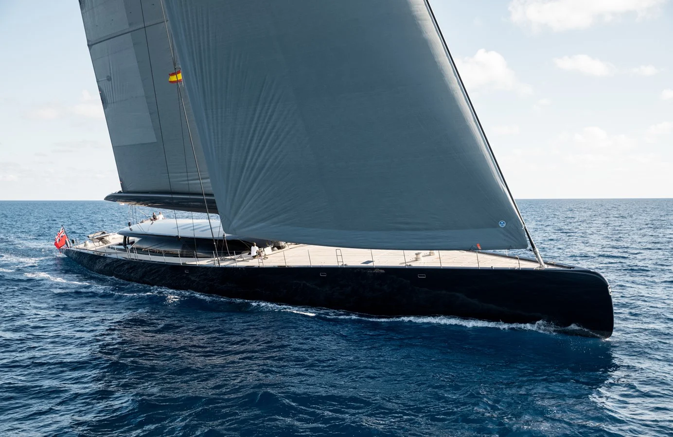 Royal Huisman 190 Ngoni yacht running at speed across open waters