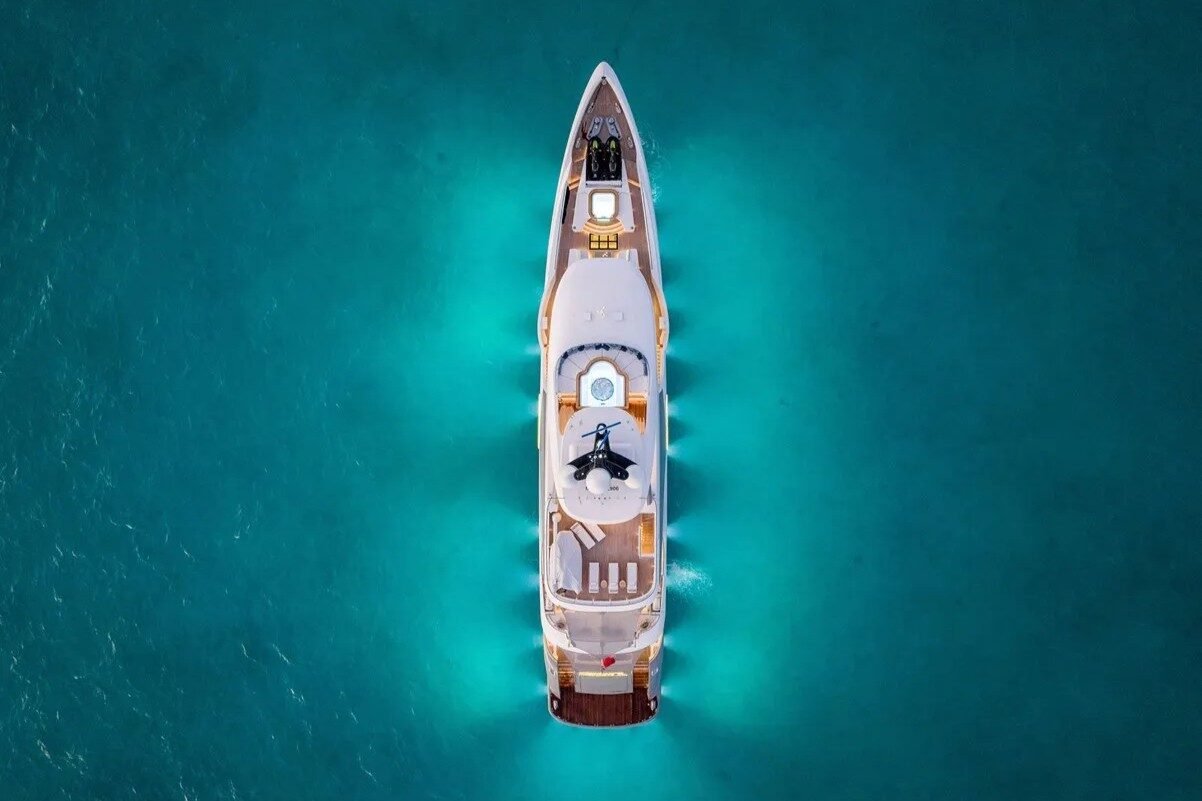 Top aerial night view of Bilgin Yachts 156 Moonraker with glowing lights illuminating the decks.
