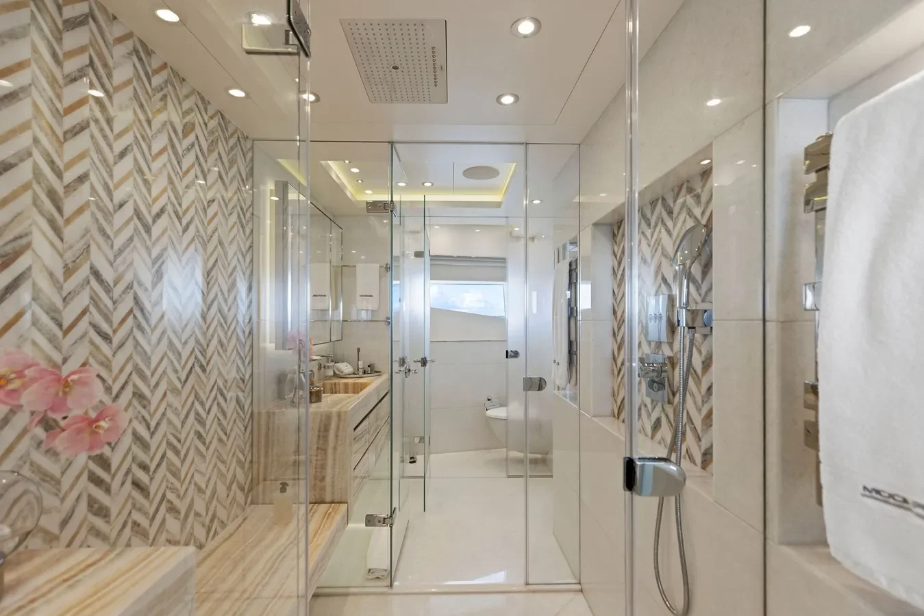 Modern bathroom onboard Bilgin Yachts 156 Moonraker with glass-enclosed shower and refined finishes.
