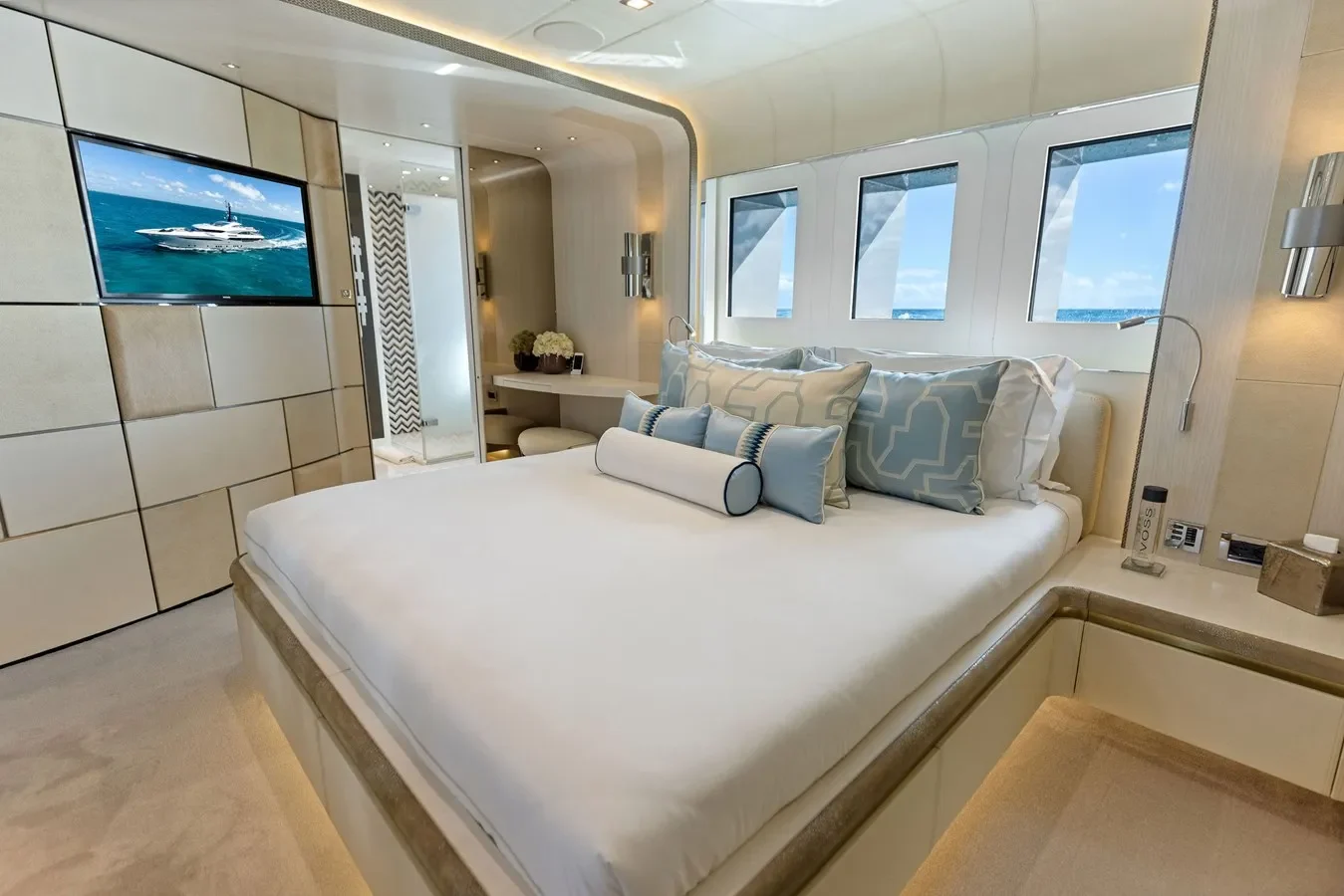 Elegant yacht guest bedroom with modern design, premium finishes, and ambient lighting.