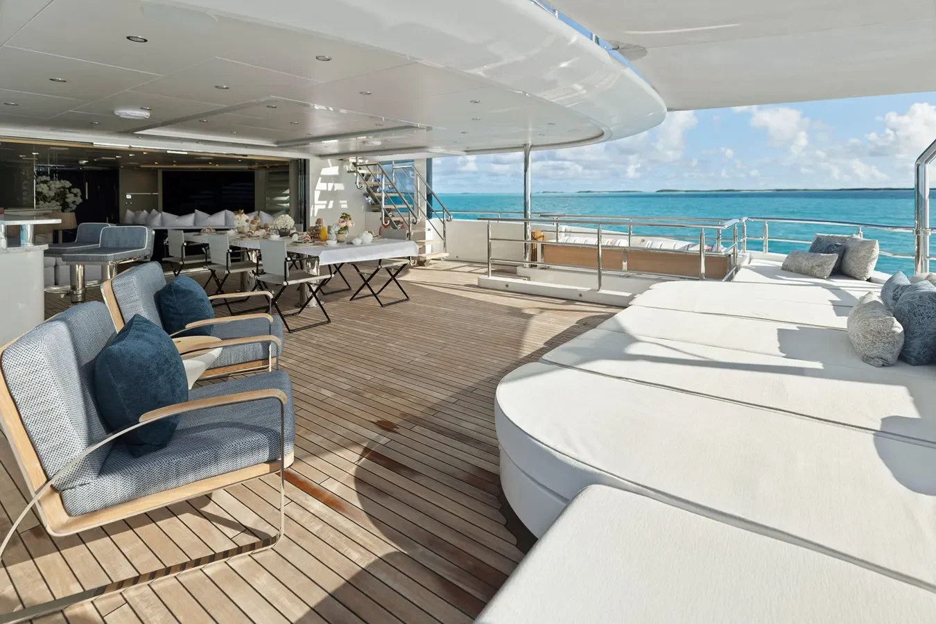 Aft dining and lounge area on Bilgin Yachts 156 “Moonraker” with elegant seating and sea views.