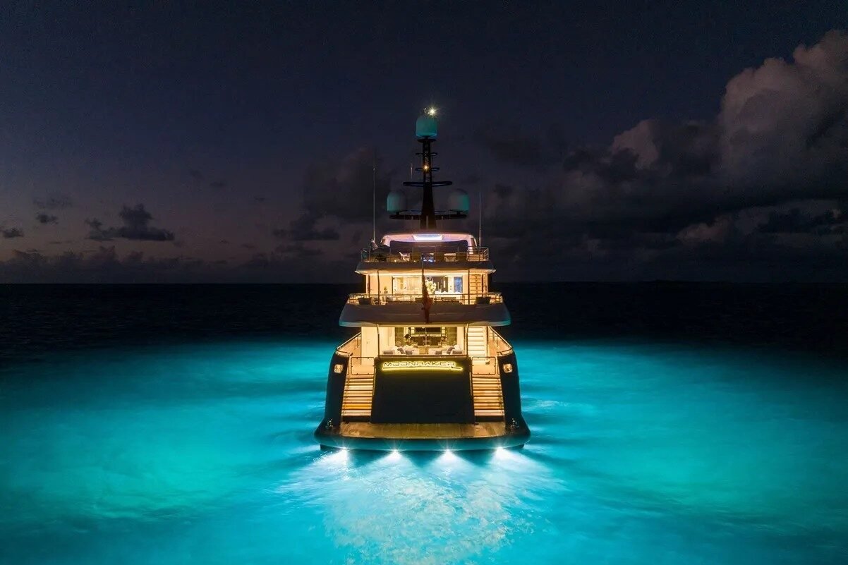 Stern night view of Bilgin Yachts 156 Moonraker with glowing lights.