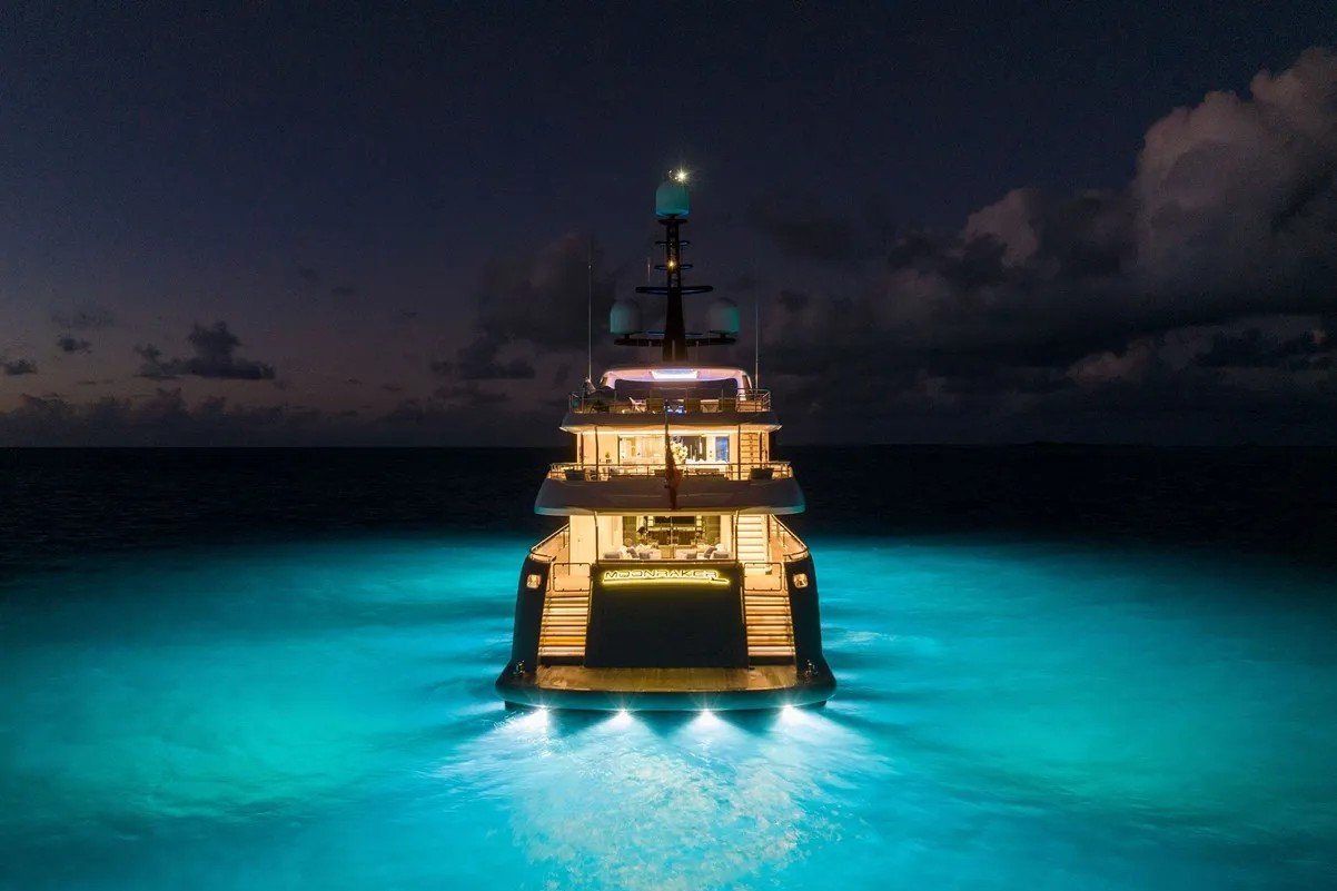 Stern night view of Bilgin Yachts 156 Moonraker with glowing lights.