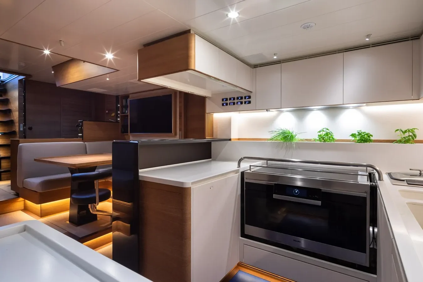 Baltic Yachts 142 Canova yacht kitchen with sitting area for casual dining