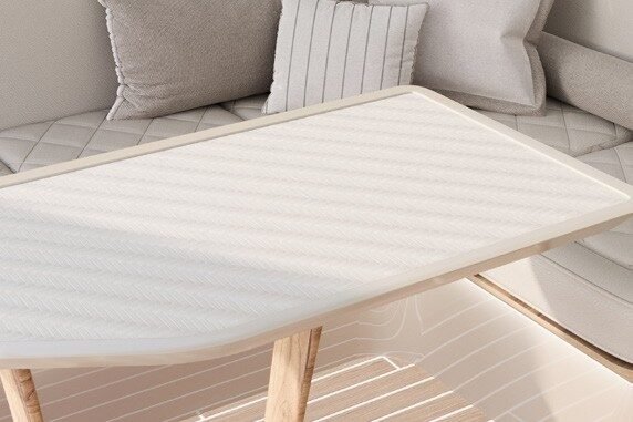 Sunreef Ultima 44 lounge area featuring a table and comfortable seating.