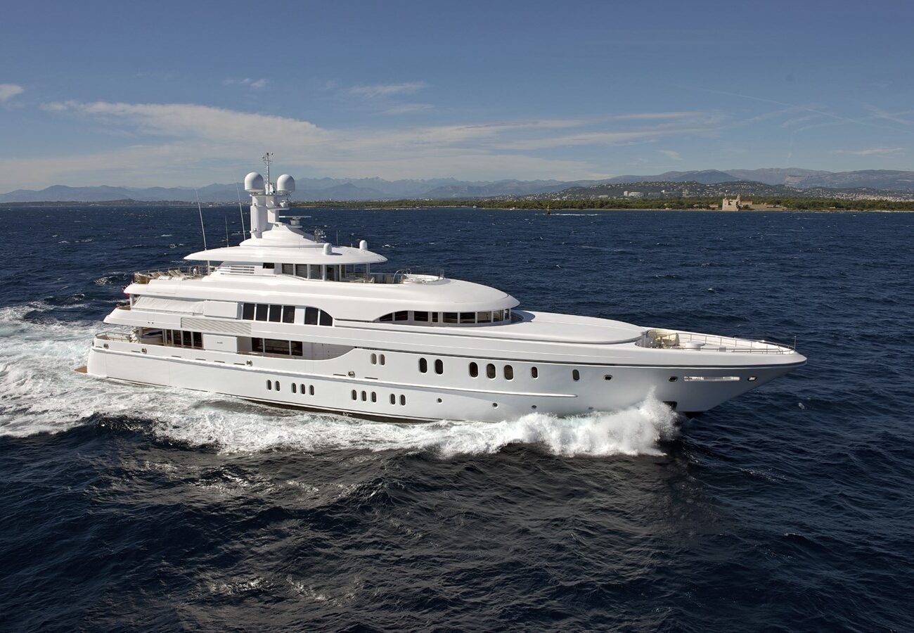 Exterior view of BELLA VITA for charter showcasing its sleek profile, elegant lines, and expansive decks.
