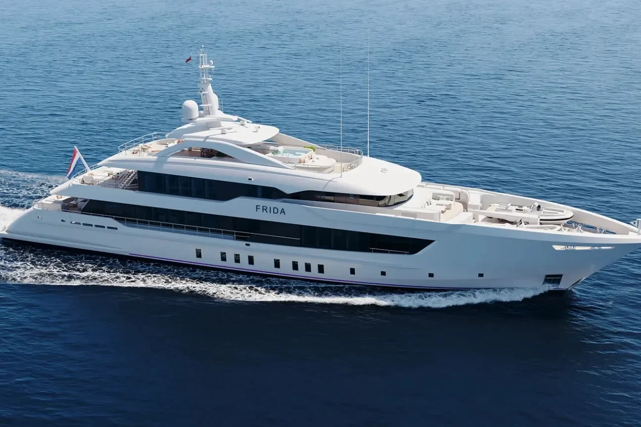Heesen FRIDA 55M yacht cruising at high speed on open water