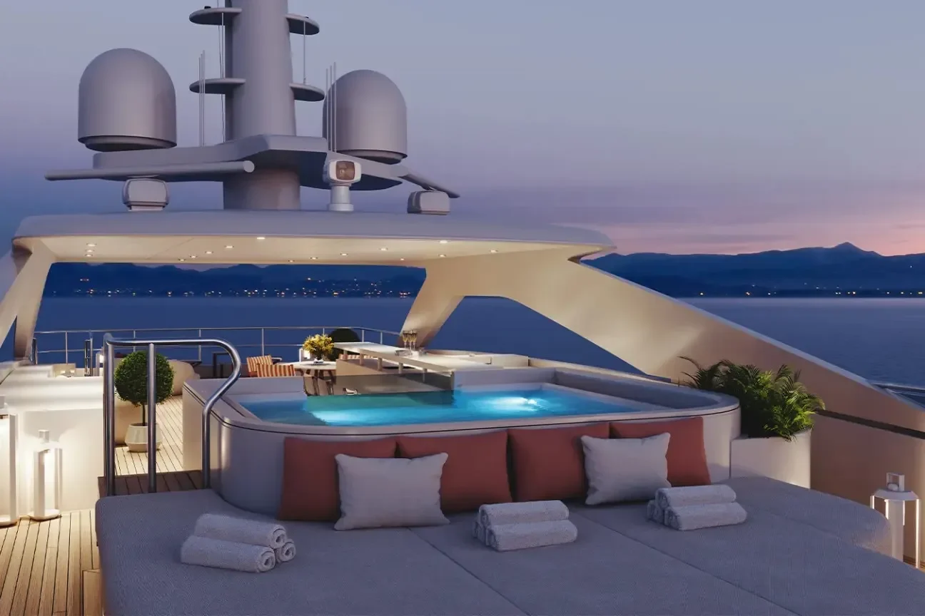Evening view of the sun deck jacuzzi on the Heesen FRIDA 55M yacht overlooking the sea
