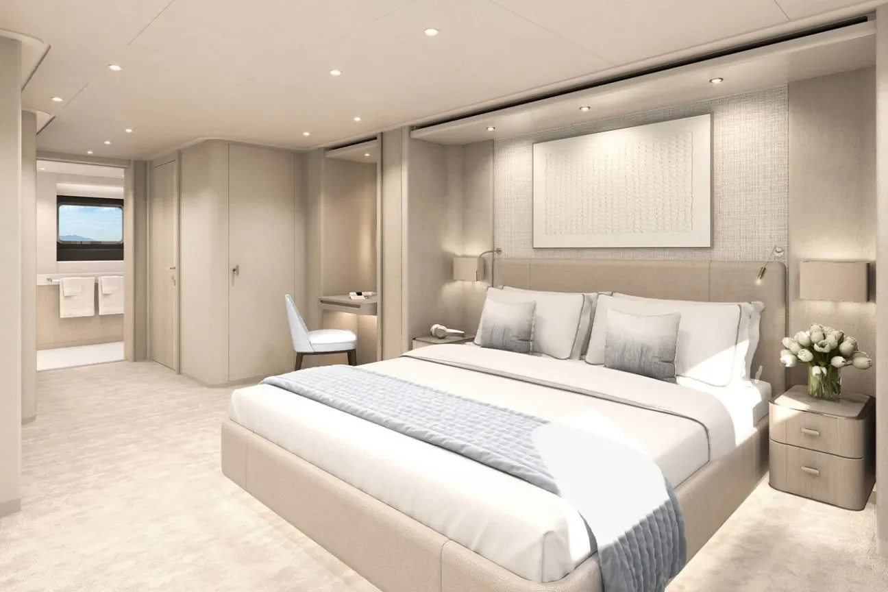 VIP guest cabin on the Heesen GRACE 50M featuring king bed, soft neutral décor, and ensuite access