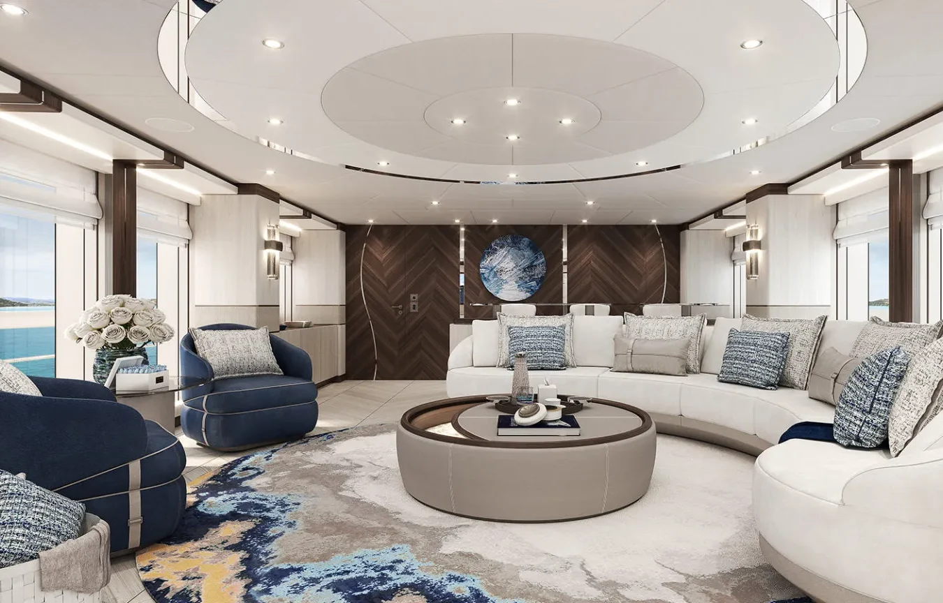 Sophia 50M superyacht main salon with circular sofa, modern décor, and panoramic ocean views