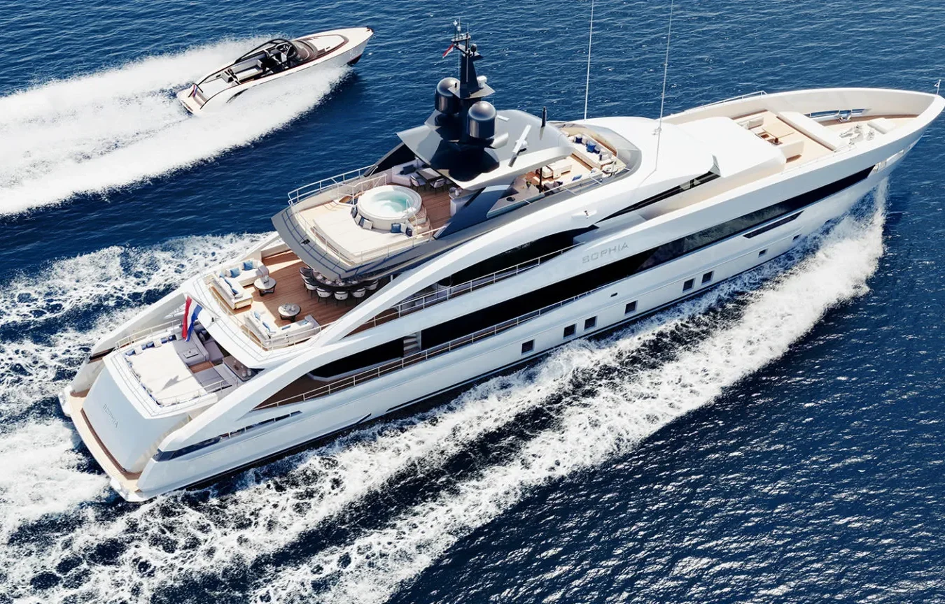 Aerial view of the Sophia 50M superyacht cruising alongside a high-speed tender