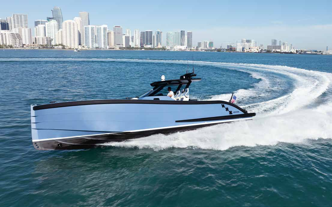 Lekker 45 yacht turning at speed near city skyline