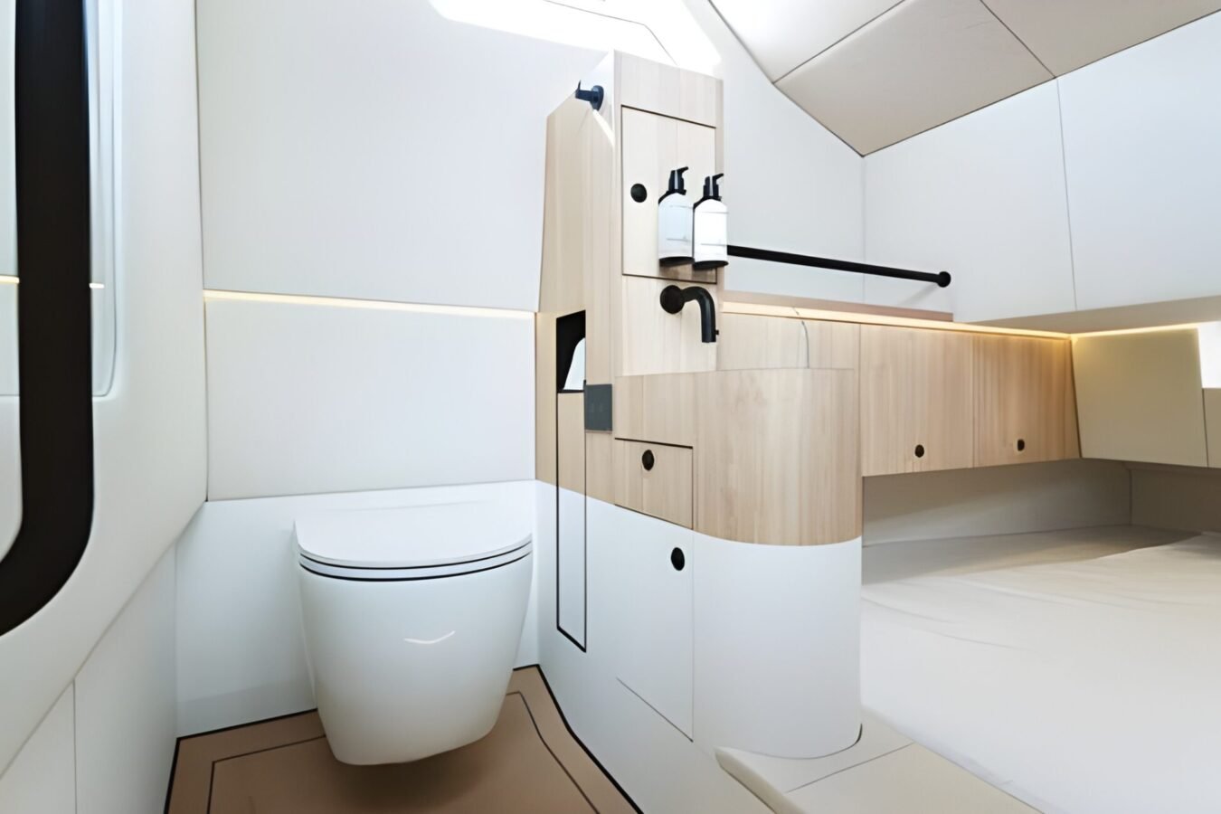 LEKKER 38 yacht cabin featuring integrated bathroom, modern cabinetry, and forward sleeping berth layout