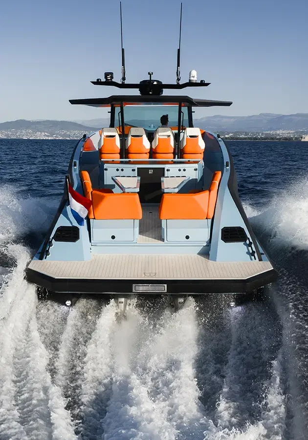 LEKKER 45 yacht stern view underway showing aft seating and wake