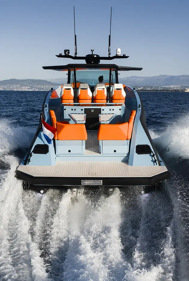 LEKKER 45 yacht stern view underway showing aft seating and wake