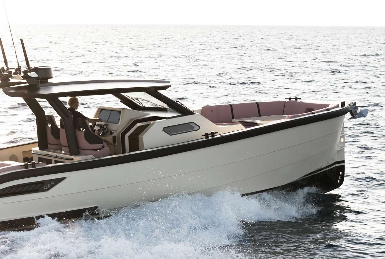 LEKKER 38 yacht cruising at speed, showing aluminium hull profile, open cockpit, and calm sea conditions