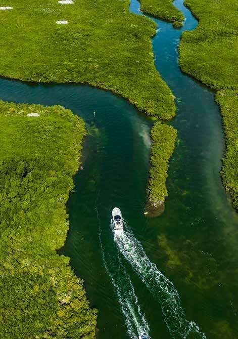 Lekker 45 yacht cruising through winding coastal waterways
