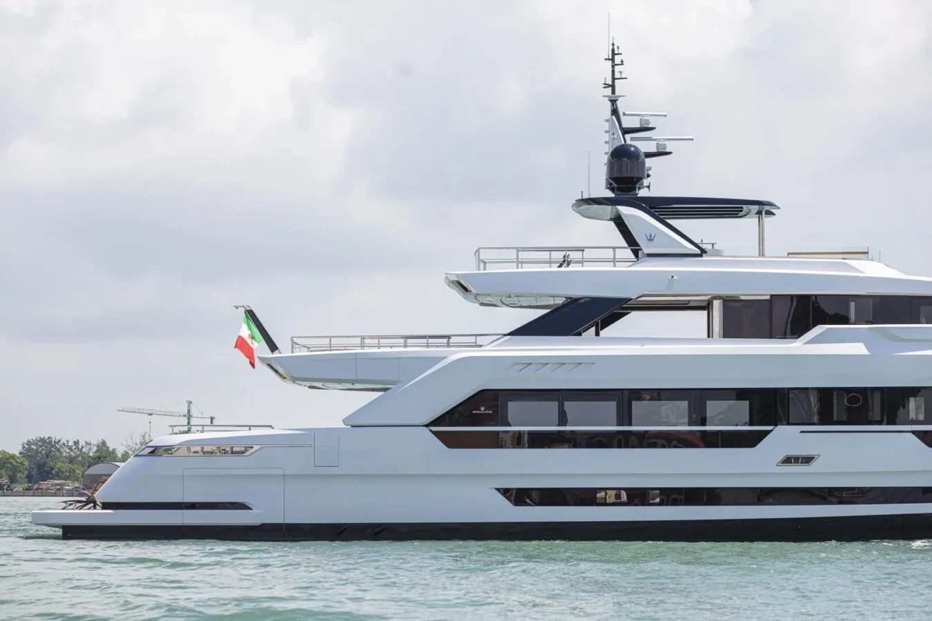 Ocean King Ducale 120 explorer yacht starboard-side profile with multi-deck superstructure and Italian flag